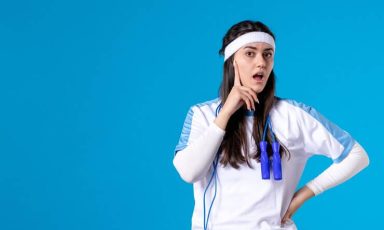 front-view-pretty-female-sport-clothes-with-skipping-rope_179666-25597